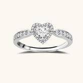 Complete jewelry set with heart-shaped sterling silver pieces featuring brilliant moissanite stones on white background.