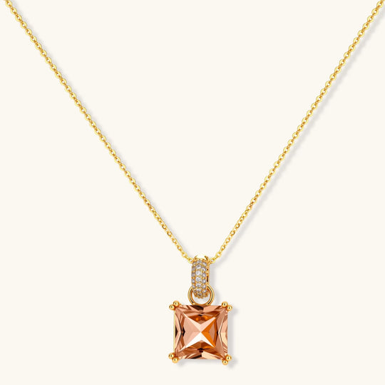 14K gold plated jewelry set featuring square champagne CZ stones with sparkling huggie earrings on cream background.