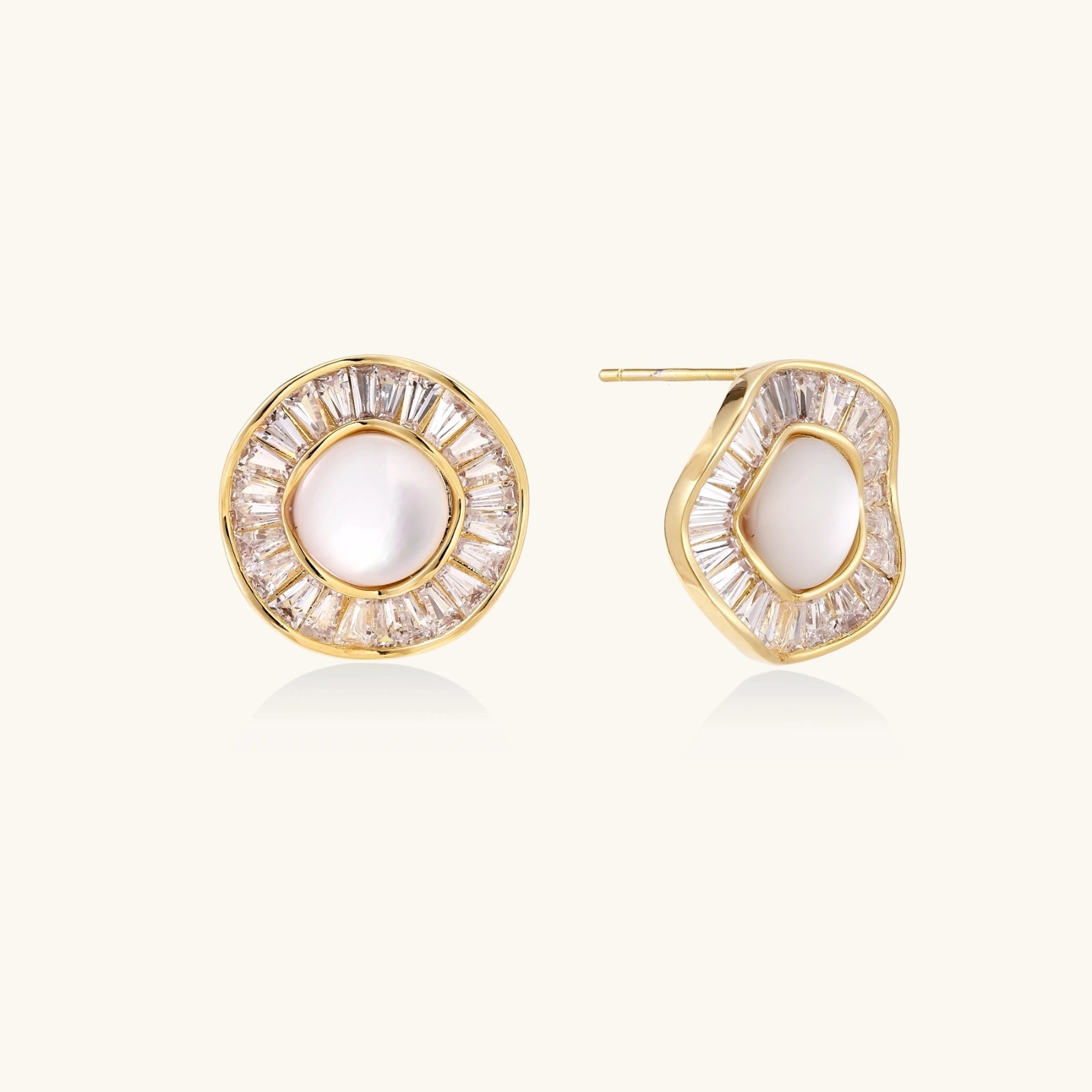 Round 14K gold-plated stud earrings with a mother of pearl center surrounded by baguette-cut crystals, 16mm.