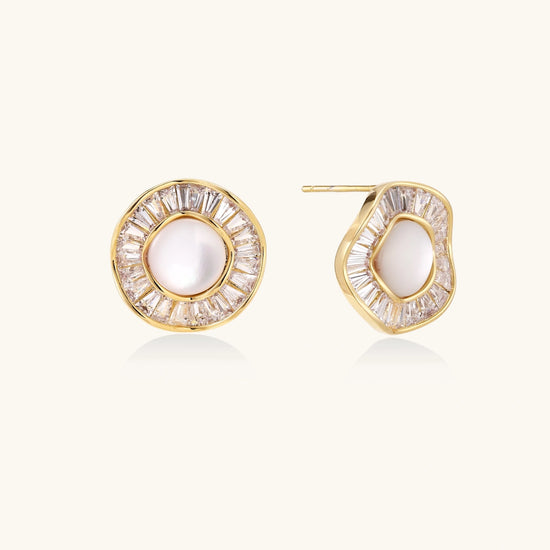 Round 14K gold-plated stud earrings with a mother of pearl center surrounded by baguette-cut crystals, 16mm.